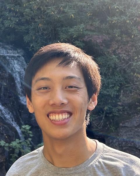 Jason in front of waterfall